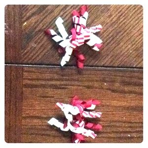 Two red and white bows